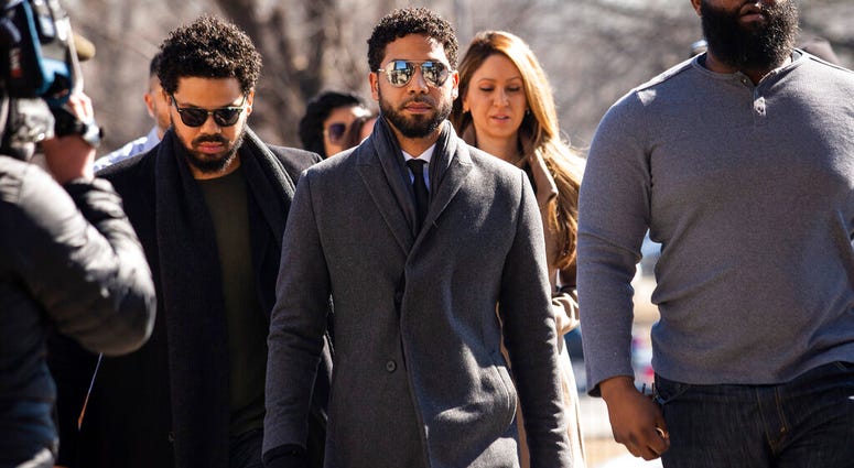 "Empire" actor Jussie Smollett, center, arrives at Leighton Criminal Court Building for a hearing to discuss whether cameras will be allowed in the courtroom during his disorderly conduct case on Tuesday, March 12, 2019, in Chicago. Jussie Smollett