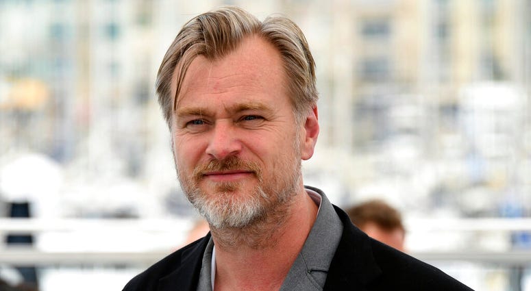 In this May 12, 2018 file photo, director Christopher Nolan poses for photographers during a photo call for "Rendezvous with Christopher Nolan" at the 71st international film festival, Cannes, southern France. Christopher Nolan