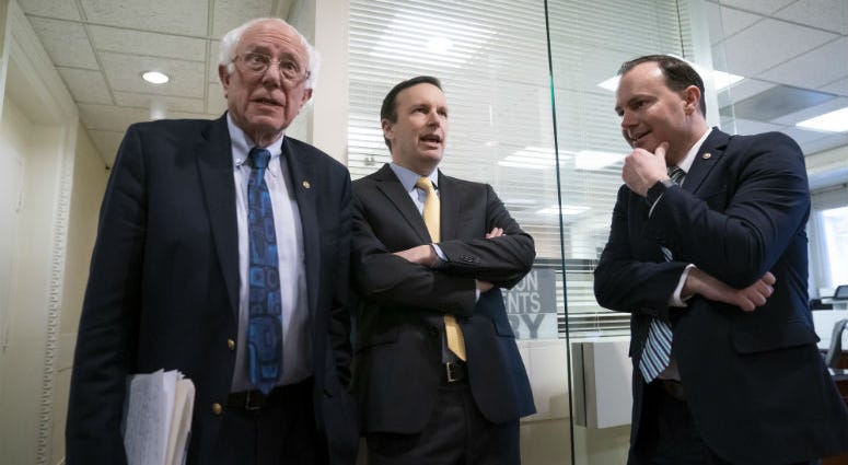 From left, Sen. Bernie Sanders, I-Vt., Sen. Chris Murphy, D-Conn., and Sen. Mike Lee, R-Utah, meet before holding a news conference on the Senate vote on ending U.S. support for the Saudi Arabian-led coalition fighting in Yemen, at the Capitol in Washingt From left, Sen. Bernie Sanders, I-Vt., Sen. Chris Murphy, D-Conn., and Sen. Mike Lee, R-Utah, meet before holding a news conference on the Senate vote on ending U.S. support for the Saudi Arabian-led coalition fighting in Yemen, at the Capitol in Washingt