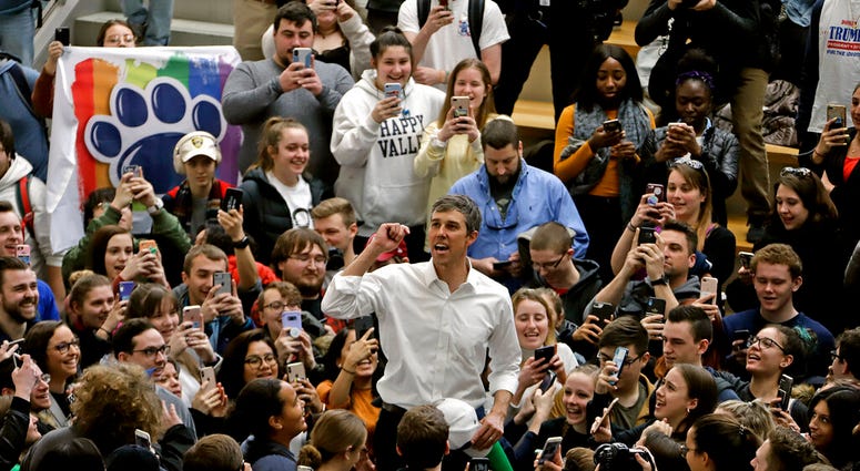 Democratic presidential candidate Beto O'Rourke, center, thanks students as he leaves the The Hub Robison Center on the Penn State campus in State College, Pa., Tuesday, March 19, 2019. Beto O'Rourke