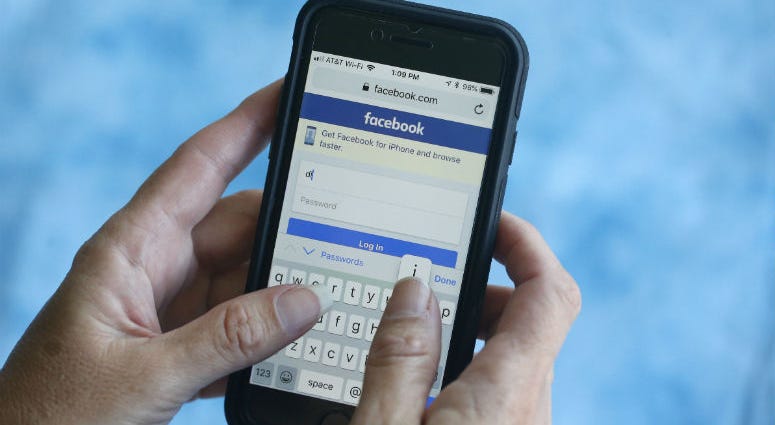 Facebook said Thursday, March 21, 2019, that it stored millions of its users’ passwords in plain text for years. A Facebook start page is shown on a smartphone in Surfside, Fla.