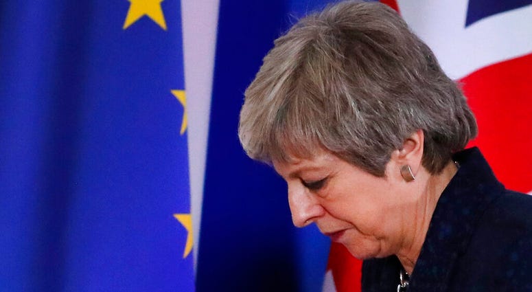 British Prime Minister Theresa May leaves after addressing a media conference at an EU summit in Brussels. British Prime Minister Theresa May leaves after addressing a media conference at an EU summit in Brussels, March 22, 2019.