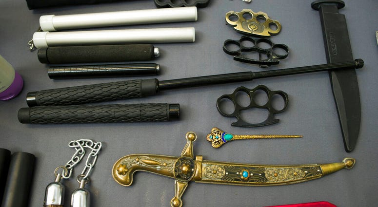 Items, prohibited on passenger airlines, and confiscated from passengers by Transportation Security Administration (TSA) officers, is displayed at Dulles International Airport in Dulles, Va., Tuesday, March 26, 2019. Items, prohibited on passenger airlines, and confiscated from passengers by TSA officers.