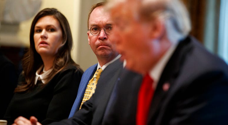 White House press secretary Sarah Sanders and acting White House Chief of Staff Mick Mulvaney listen as President Donald Trump speaks during a meeting with NATO Secretary General Jens Stoltenberg in the Cabinet Room of the White House, Tuesday, April 2, 2 White House press secretary Sarah Sanders and acting White House Chief of Staff Mick Mulvaney listen as President Donald Trump speaks during a meeting with NATO Secretary General Jens Stoltenberg in the Cabinet Room of the White House.