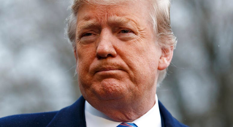 President Donald Trump speaks with reporters before boarding Marine One on the South Lawn of the White House, Friday, April 5, 2019, in Washington. Donald Trump