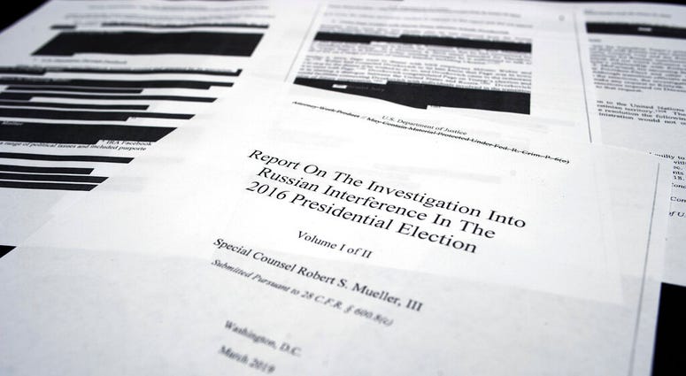 Four pages of special counsel Robert Mueller report on the witness table in the House Intelligence Committee hearing room on Capitol Hill, in Washington, Thursday, April 18, 2019. Mueller report