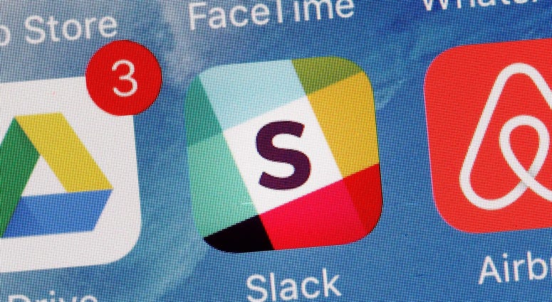 In this Tuesday, Jan. 31, 2017, file photo, the Slack app is displayed on a mobile phone in New York. In this Tuesday, Jan. 31, 2017, file photo, the Slack app is displayed on a mobile phone in New York.