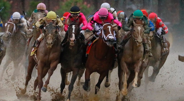 Luis Saez riding Maximum Security, second from right, goes around turn four with Flavien Prat riding Country House, left, Tyler Gaffalione riding War of Will and John Velazquez riding Code of Honor, right, during the 145th running of the Kentucky Derby ho Luis Saez riding Maximum Security, second from right, goes around turn four with Flavien Prat riding Country House, left, Tyler Gaffalione riding War of Will and John Velazquez riding Code of Honor, right, during the 145th running of the Kentucky Derby ho