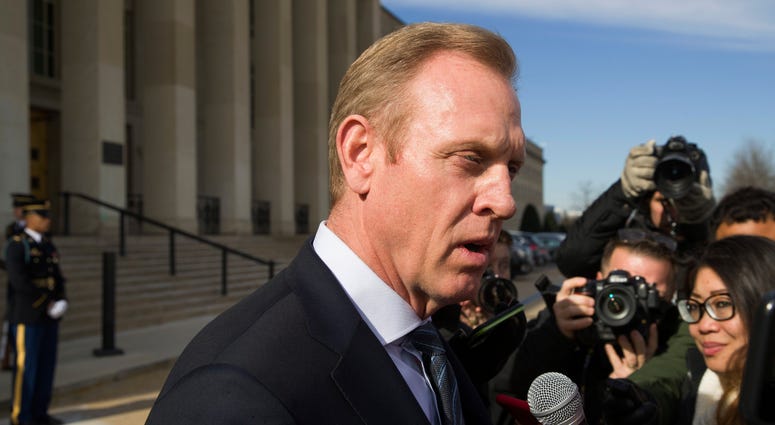 In this Jan. 28, 2019, file photo, acting Defense Secretary Pat Shanahan speaks with the media as he waits for the arrival of NATO Secretary General Jens Stoltenberg at the Pentagon in Washington. In this Jan. 28, 2019, file photo, acting Defense Secretary Pat Shanahan speaks with the media as he waits for the arrival of NATO Secretary General Jens Stoltenberg at the Pentagon in Washington.
