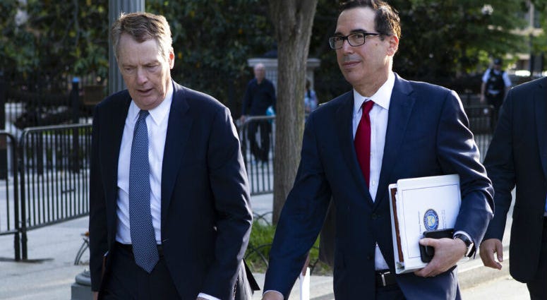 United States Trade Representative Robert Lighthizer, left, and Treasury Secretary Steven Mnuchin walk on Pennsylvania Avenue back to the White House after meeting with Chinese Vice Premier Liu He for trade talks Thursday, May 9, 2019, in Washington. United States Trade Representative Robert Lighthizer, left, and Treasury Secretary Steven Mnuchin walk on Pennsylvania Avenue back to the White House after meeting with Chinese Vice Premier Liu He for trade talks Thursday, May 9, 2019, in Washington.