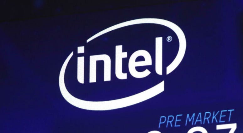 FILE - In this Oct. 3, 2018, file photo the Intel logo appears on a screen at the Nasdaq MarketSite, in New York's Times Square. Intel has revealed another hardware security flaw that could affects millions of machines around the world.