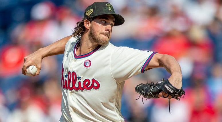 Philadelphia Phillies starting pitcher Aaron Nola throws during the first inning of a baseball game against the Colorado Rockies, Saturday, May 18, 2019, in Philadelphia. Philadelphia Phillies starting pitcher Aaron Nola