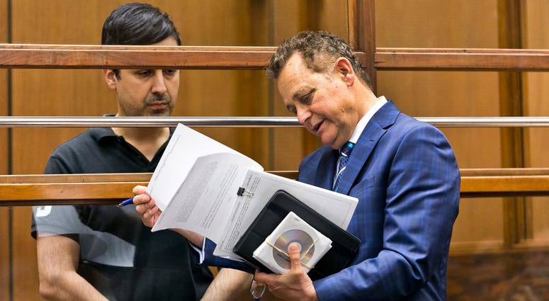Keya Morgan, former business manager of late Stan Lee, accused of stealing money and falsely imprisoning the late comic book creator, left, appears for a court hearing with his defense attorney, Alex Kessel in LA County Superior Court June 5, 2019. Keya Morgan