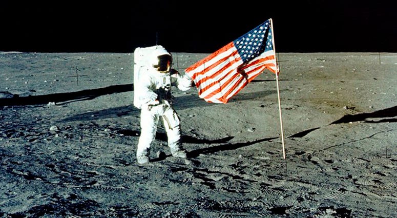 In this Nov. 1969 photo made available by NASA, Apollo 12 mission Commander Charles P. "Pete" Conrad stands on the moon's surface. In this Nov. 1969 photo made available by NASA, Apollo 12 mission Commander Charles P. "Pete" Conrad stands on the moon's surface.