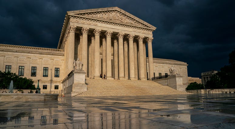 The Supreme Court is seen under stormy skies in Washington, Thursday, June 20, 2019. The Supreme Court is seen under stormy skies in Washington, Thursday, June 20, 2019.