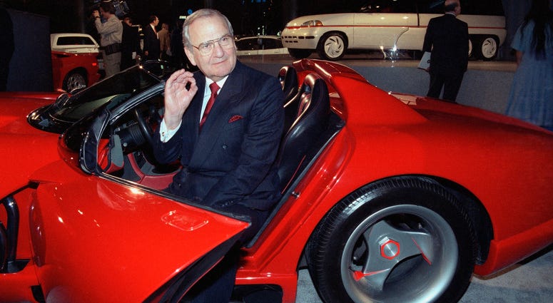 In this March 28, 1990, file photo, Chrysler Corporation Chairman Lee Iacocca sits in a 1990 Dodge Viper sports car as the Chrysler in the 90's six city tour makes a visit to New York. In this March 28, 1990, file photo, Chrysler Corporation Chairman Lee Iacocca sits in a 1990 Dodge Viper sports car as the Chrysler in the 90's six city tour makes a visit to New York.
