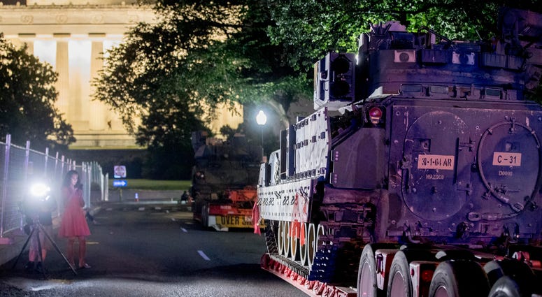 Two Bradley Fighting Vehicles are parked next to the Lincoln Memorial before President Donald Trump's "Salute to America," event honoring service branches on Independence Day, Tuesday, July 2, 2019, in Washington. Two Bradley Fighting Vehicles are parked next to the Lincoln Memorial before President Donald Trump's "Salute to America," event honoring service branches on Independence Day, Tuesday, July 2, 2019, in Washington.