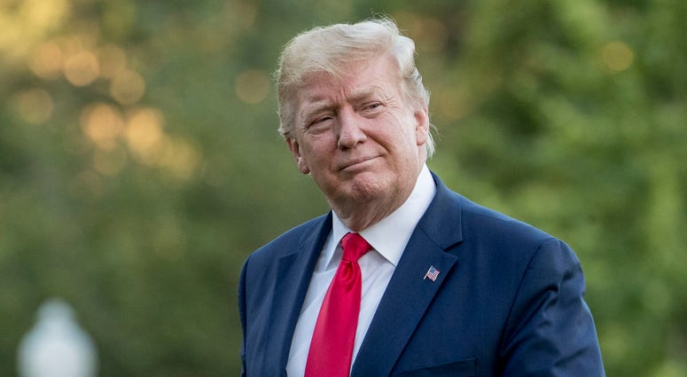 In this June 30, 2019 file photo, President Donald Trump walks across the South Lawn as he arrives at the White House in Washington. In this June 30, 2019 file photo, President Donald Trump walks across the South Lawn as he arrives at the White House in Washington.