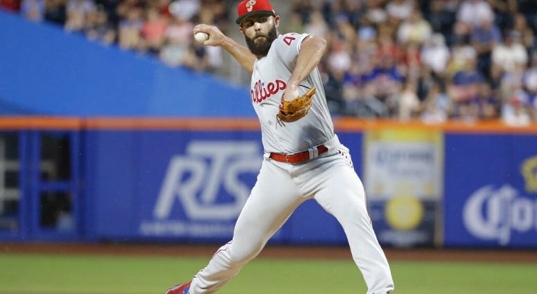 Philadelphia Phillies' Jake Arrieta delivers a pitch during the first inning of a baseball game against the New York Mets, Saturday, July 6, 2019, in New York. Philadelphia Phillies' Jake Arrieta delivers a pitch during the first inning of a baseball game against the New York Mets, Saturday, July 6, 2019, in New York.