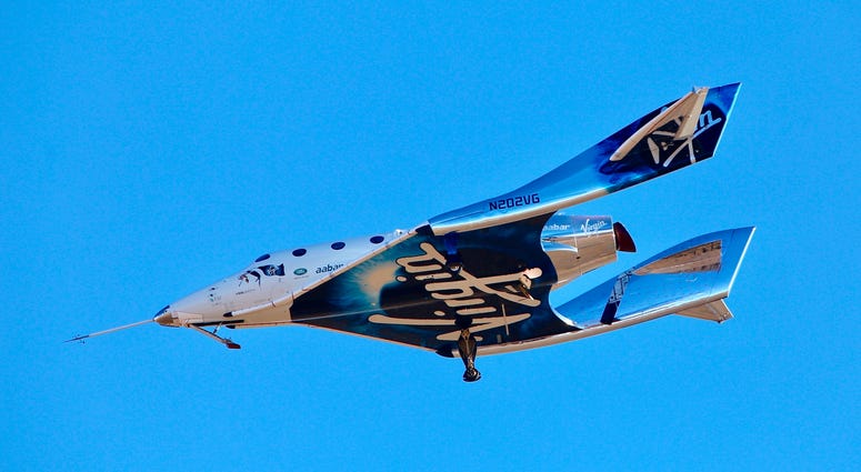 In this Dec. 13, 2018 file photo, a view of Virgin Galactic prior to it reaching space for the first time during its 4th powered flight from Mojave, Calif. In this Dec. 13, 2018 file photo, a view of Virgin Galactic prior to it reaching space for the first time during its 4th powered flight from Mojave, Calif.