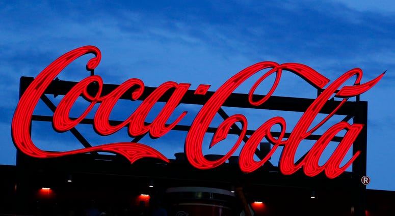 In this July 20, 2019, photo a Coca-Cola billboard is shown over left field at SunTrust Park during a baseball game between the Washington Nationals and Atlanta Braves in Atlanta. In this July 20, 2019, photo a Coca-Cola billboard is shown over left field at SunTrust Park during a baseball game between the Washington Nationals and Atlanta Braves in Atlanta.