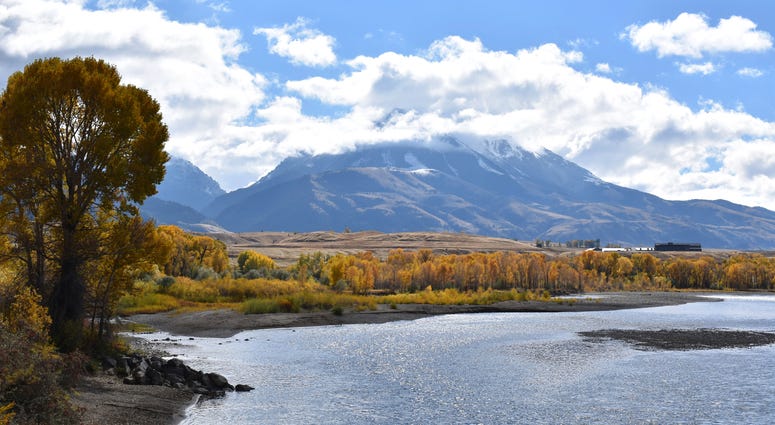 In this Oct. 8, 2018 file photo, emigrant Peak is seen rising above the Paradise Valley and the Yellowstone River near Emigrant, Mont. In this Oct. 8, 2018 file photo, emigrant Peak is seen rising above the Paradise Valley and the Yellowstone River near Emigrant, Mont.
