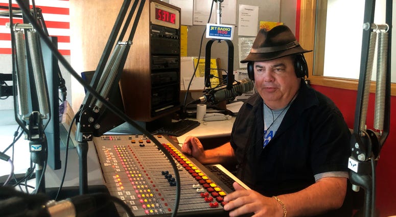 Months ago, Bremner had tried to establish if his listeners could agree on a fundamental question: what is racism? The answer, he realized, is no, we don't even agree on that. In this Friday, Aug. 2, 2019, photo, Scott Bremner, talk radio host, works in Erie, Pa.