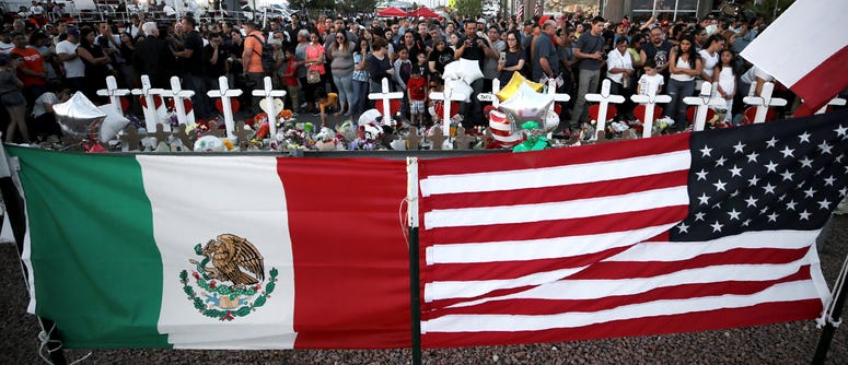 People show up in masses Monday, Aug. 5, 2019, to pay their respects to those who lost their lives in Saturday's attack in El Paso, Texas. People show up in masses Monday, Aug. 5, 2019, to pay their respects to those who lost their lives in Saturday's attack in El Paso, Texas.