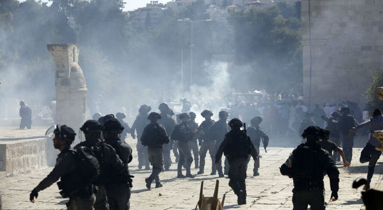 Israeli police clashes with Palestinian worshippers at al-Aqsa mosque compound in Jerusalem, Sunday, Aug 11, 2019. Clashes have erupted between Muslim worshippers and Israeli police at a major Jerusalem holy site during prayers marking the Islamic holiday Israeli police clashes with Palestinian worshippers at al-Aqsa mosque compound in Jerusalem, Sunday, Aug 11, 2019. Clashes have erupted between Muslim worshippers and Israeli police at a major Jerusalem holy site during prayers marking the Islamic holiday