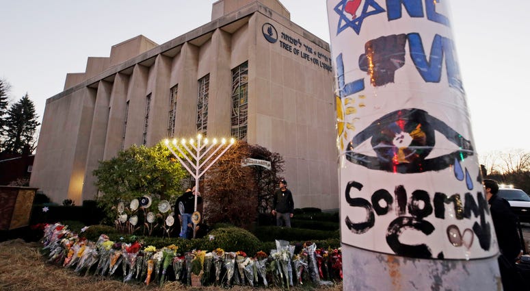 This Dec. 2, 2018, file photo shows a memorial outside the Tree of Life Synagogue, where Robert Bowers killed worshippers in an Oct. 27 shooting in the Squirrel Hill neighborhood of Pittsburgh. This Dec. 2, 2018, file photo shows a memorial outside the Tree of Life Synagogue, where Robert Bowers killed worshippers in an Oct. 27 shooting in the Squirrel Hill neighborhood of Pittsburgh.