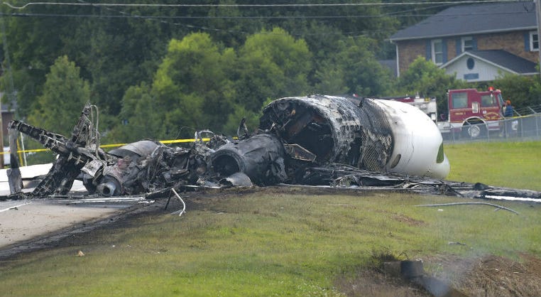 The burned remains of a plane that was carrying NASCAR television analyst and former driver Dale Earnhardt Jr. lie near a runway Thursday, Aug. 15, 2019, in Elizabethton, Tenn. The burned remains of a plane that was carrying NASCAR television analyst and former driver Dale Earnhardt Jr. lie near a runway Thursday, Aug. 15, 2019, in Elizabethton, Tenn.