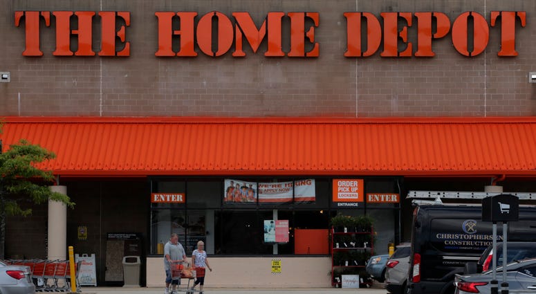Shoppers leave the Home Depot store in Manchester, N.H., Thursday, Aug. 15, 2019. Shoppers leave the Home Depot store in Manchester, N.H., Thursday, Aug. 15, 2019.