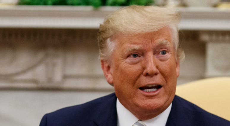 President Donald Trump speaks during a meeting with Romanian President Klaus Iohannis in the Oval Office of the White House, Tuesday, Aug. 20, 2019, in Washington. President Donald Trump speaks during a meeting with Romanian President Klaus Iohannis in the Oval Office of the White House, Tuesday, Aug. 20, 2019, in Washington.