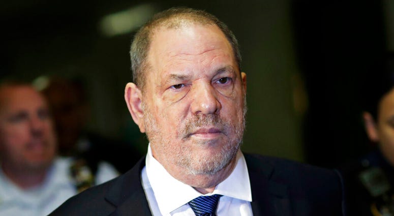 FILE - In this Oct. 11, 2018, file photo, Harvey Weinstein enters State Supreme Court in New York. A lawyer for Weinstein has asked that the disgraced movie mogul's upcoming criminal trial be moved out of New York City, saying he can't get a fair trial.