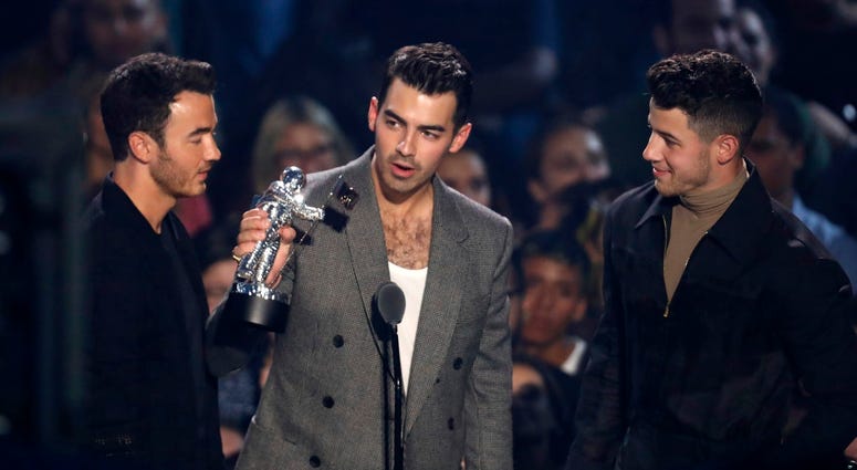 Kevin Jonas, from left, Joe Jonas and Nick Jonas, of the Jonas Brothers accept the best pop award for "Sucker" at the MTV Video Music Awards at the Prudential Center on Monday, Aug. 26, 2019, in Newark, N.J. Kevin Jonas, from left, Joe Jonas and Nick Jonas, of the Jonas Brothers accept the best pop award for "Sucker" at the MTV Video Music Awards at the Prudential Center on Monday, Aug. 26, 2019, in Newark, N.J.