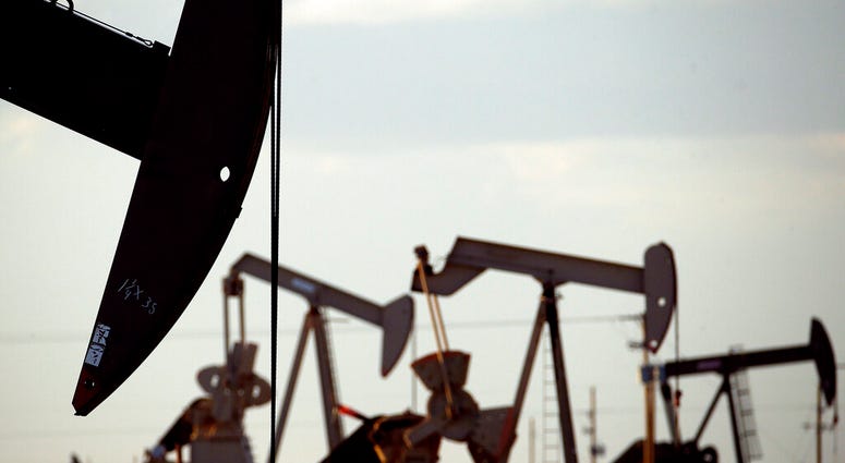 FILE - In this April 24, 2015, file photo, pumpjacks work in a field near Lovington, N.M. Oil industry and environmental groups say they expect the Environmental Protection Agency to release a proposed rule over the next few days that will roll back requirements on detecting and plugging methane leaks.