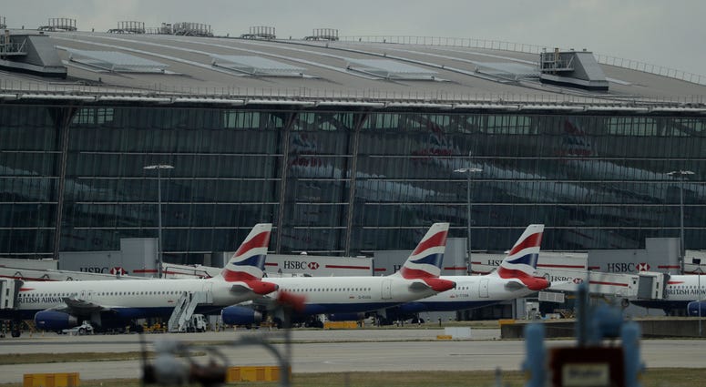 British Airways planes sit parked at Heathrow Airport in London, Sept. 9, 2019. British Airways says it has had to cancel almost all flights as a result of a pilots' 48-hour strike over pay. British Airways