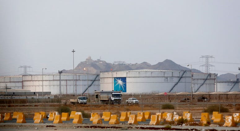 Storage tanks are seen at the North Jiddah bulk plant, an Aramco oil facility, in Jiddah, Saudi Arabia, Sunday, Sept. 15, 2019. Storage tanks at North Jiddah Aramco oil facility