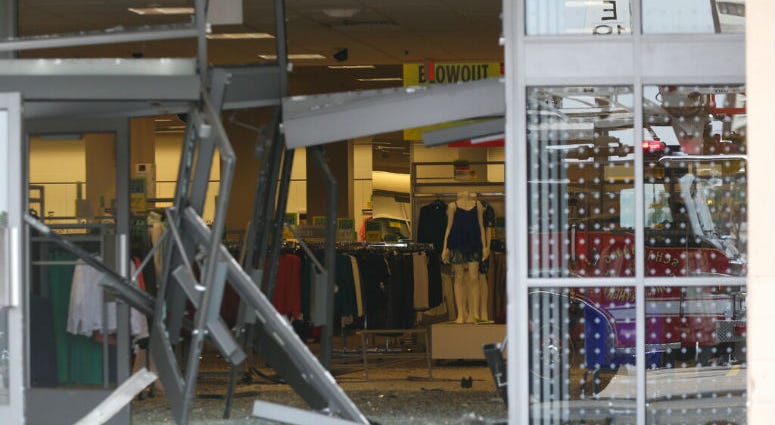 The damaged storefront of the Sears store at Woodfield Mall is seen after a man drove an SUV into the store in the Chicago suburb of Schaumburg, Ill., on Friday, Sept. 20, 2019. The damaged storefront of the Sears store at Woodfield Mall is seen after a man drove an SUV into the store in the Chicago suburb of Schaumburg, Ill..