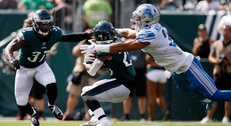 Detroit Lions' Miles Killebrew, right, tackles Philadelphia Eagles' Miles Sanders during the first half of an NFL football game, Sunday, Sept. 22, 2019, in Philadelphia. Detroit Lions' Miles Killebrew, right, tackles Philadelphia Eagles' Miles Sanders during the first half of an NFL football game, Sunday, Sept. 22, 2019, in Philadelphia.