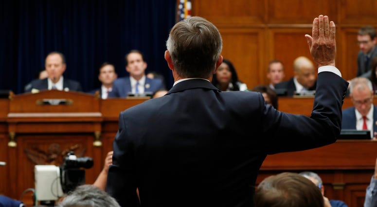 Acting Director of National Intelligence Joseph Maguire is sworn in before testifying before the House Intelligence Committee on Capitol Hill in Washington, Sept. 26, 2019. Acting Director of National Intelligence Joseph Maguire