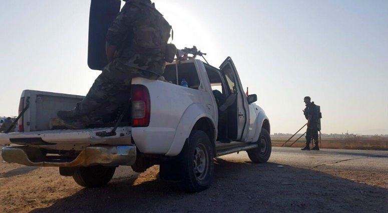 In this photo released by the Syrian official news agency SANA, Syrian troops deploy in the northern town of Tal Tamr, Monday, Oct 14, 2019. Syrian troops deploy in the northern town of Tal Tamr, Monday, Oct 14, 2019.