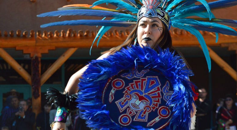 Crystal Zamora, 27, of Albuquerque, N.M., performs with the Ehecatl Aztec Dancers on Monday, Oct. 14, 2019, at the Indian Pueblo Cultural Center in Albuquerque, N.M. as part of New Mexico's first Indigenous Peoples Day. Crystal Zamora, 27, of Albuquerque, N.M., performs with the Ehecatl Aztec Dancers on Monday, Oct. 14, 2019, at the Indian Pueblo Cultural Center in Albuquerque, N.M.