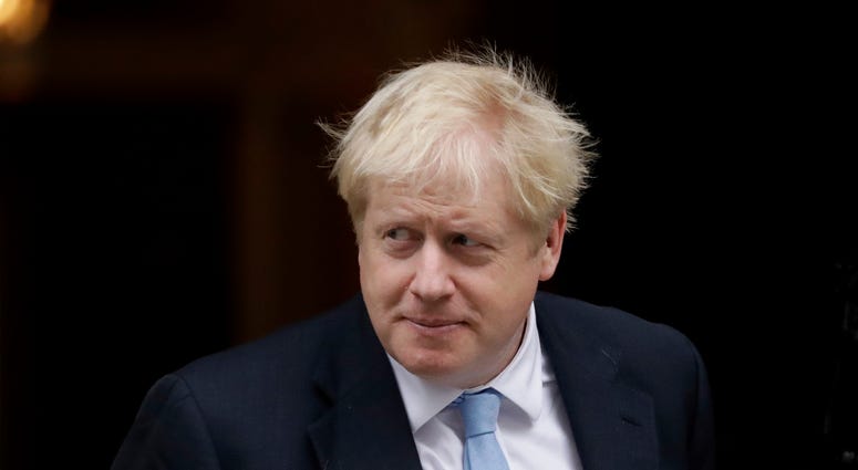 British Prime Minister Boris Johnson walks out to greet NATO Secretary General Jens Stoltenberg before their meeting at 10 Downing Street in London, Tuesday, Oct. 15, 2019. British Prime Minister Boris Johnson walks out to greet NATO Secretary General Jens Stoltenberg before their meeting at 10 Downing Street in London, Tuesday, Oct. 15, 2019.