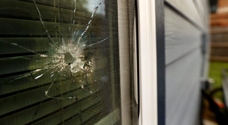 A bullet hole from the police officer's shot is seen in the rear window of Atatiana Jefferson's home on E. Allen Ave in Fort Worth, Texas, Tuesday, Oct. 15, 2019. A bullet hole from the police officer's shot is seen in the rear window of Atatiana Jefferson's home on E. Allen Ave in Fort Worth, Texas, Tuesday, Oct. 15, 2019.