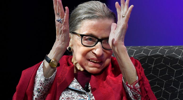 U.S. Supreme Court Justice Ruth Bader Ginsburg claps after listening to students sing opera at Amherst College in Amherst, Mass. U.S. Supreme Court Justice Ruth Bader Ginsburg claps after listening to students sing opera at Amherst College in Amherst, Mass.