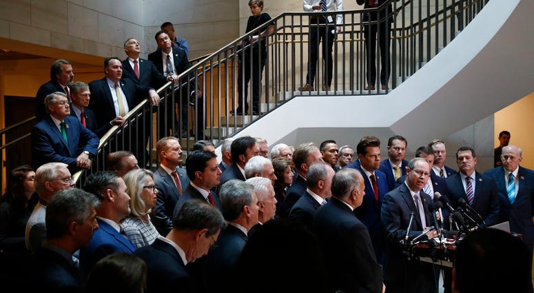 House Republicans gather for a news conference after Deputy Assistant Secretary of Defense Laura Cooper arrived for a closed door meeting to testify as part of the House impeachment inquiry into President Donald Trump, Wednesday, Oct. 23, 2019. House Republicans gather for a news conference after Deputy Assistant Secretary of Defense Laura Cooper arrived for a closed door meeting to testify as part of the House impeachment inquiry into President Donald Trump, Wednesday, Oct. 23, 2019.
