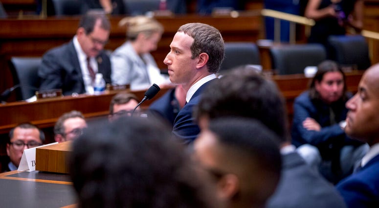 Facebook CEO Mark Zuckerberg testifies before a House Financial Services Committee hearing on Capitol Hill in Washington, Wednesday, Oct. 23, 2019, on Facebook's impact on the financial services and housing sectors. Facebook CEO Mark Zuckerberg testifies before a House Financial Services Committee hearing on Capitol Hill in Washington, Wednesday, Oct. 23, 2019, on Facebook's impact on the financial services and housing sectors.