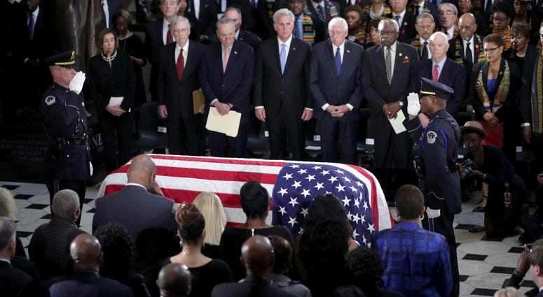 The flag-draped casket of Rep. Elijah Cummings, D-Md., lies in state at the Capitol, Thursday, Oct. 24, 2019 in Washington. Elijah Cummings funeral