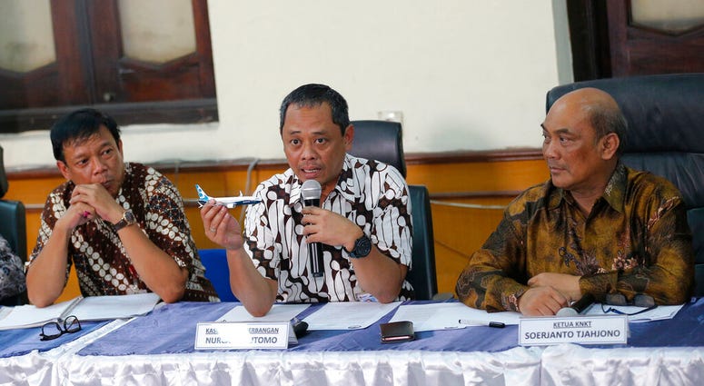 National Transportation Safety Committee investigator Nurcahyo Utomo holds a model of an airplane during a press conference in Jakarta, Indonesia, Friday, Oct. 25, 2019. National Transportation Safety Committee investigator Nurcahyo Utomo holds a model of an airplane during a press conference in Jakarta, Indonesia, Friday, Oct. 25, 2019.